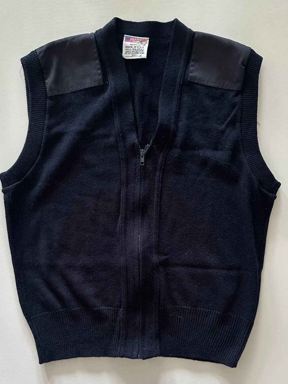 Sleeveless zip-up jacket Commando-style